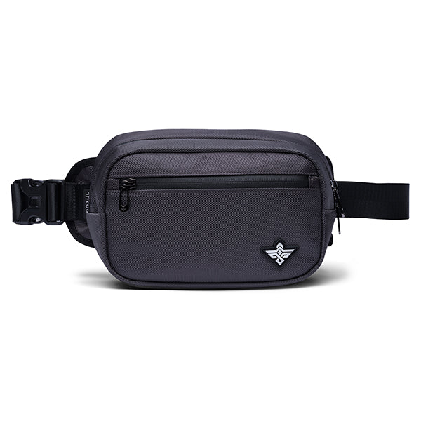 The Erozul Fortuna Smell Proof Crossbody Fanny Pack Bag is black, features a front zipper pocket, adjustable strap, buckle closure, and has a small geometric logo in the lower right corner.