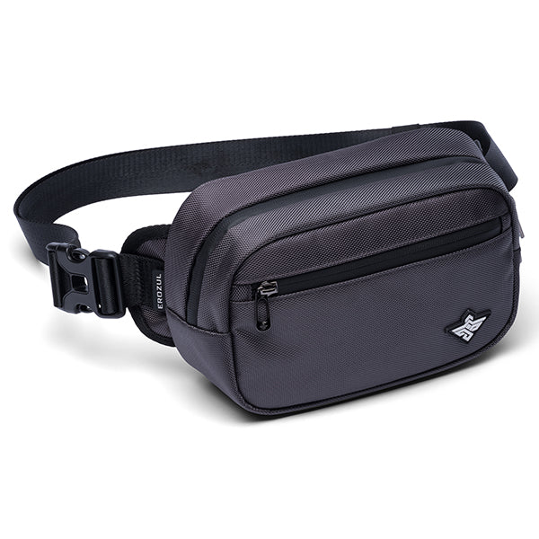 The Erozul Fortuna Smell Proof Crossbody Fanny Pack Bag is black fabric with two zippered compartments, an adjustable strap, and a plastic buckle, shown on a white background.
