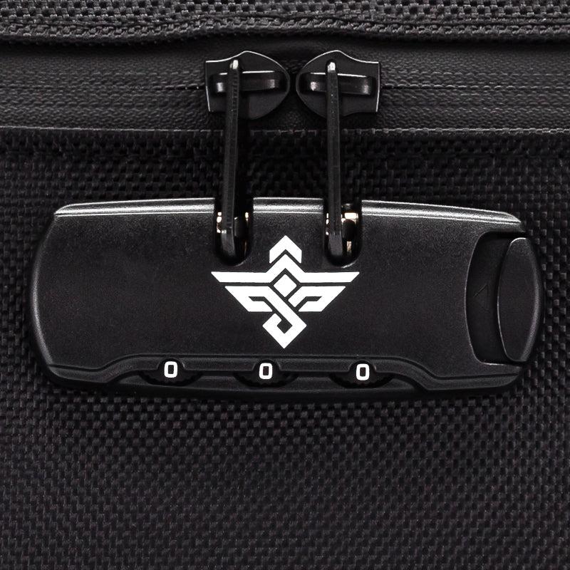 Close-up of a black combination lock with a white geometric logo, attached to a textured black fabric bag, showing the numbers set to 0-0-0.