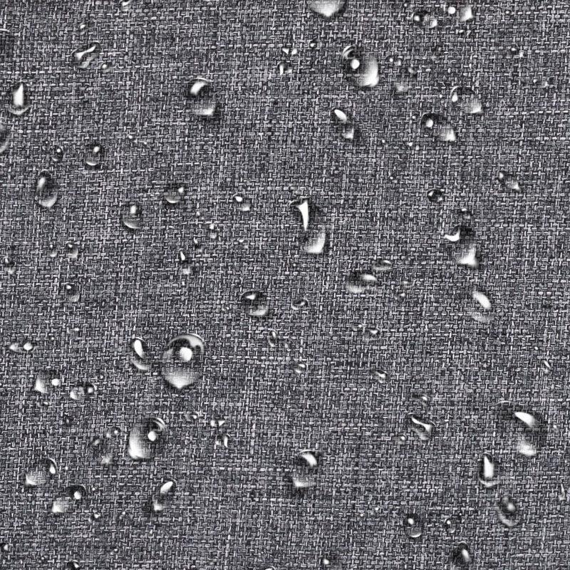 Water droplets scattered on a gray textured fabric surface, indicating the fabric is likely water-resistant or waterproof.