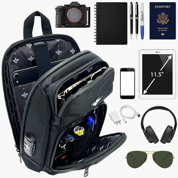 Open black Equinox Smell Proof Sling Bag With Combination Lock by Erozul, neatly organized and surrounded by travel essentials like a camera, notebook, pens, passport, tablet, phone, charger, headphones, and sunglasses.