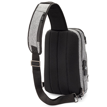 The Erozul Equinox Smell Proof Sling Bag With Combination Lock features a grey and black design, wide padded strap, mesh back panel, and zippered compartments, shown from the back.